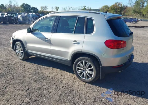 2014 Volkswagen Tiguan Sel из США, поврежденный, VIN WVGBV3AX1EW591852